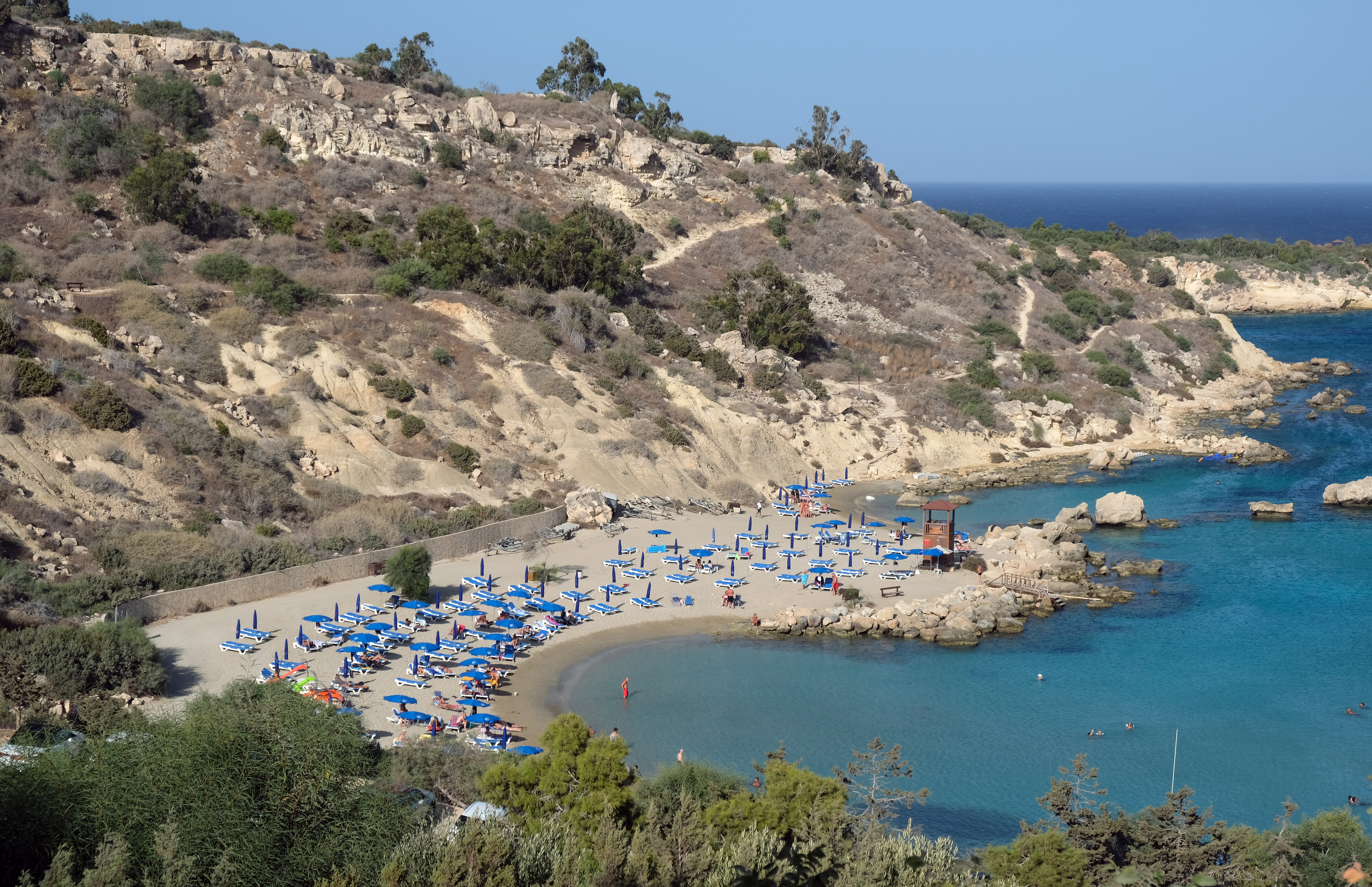 A picturesque sandy cove and blue sea at Konnos Beach, Cape Greco, Cyprus